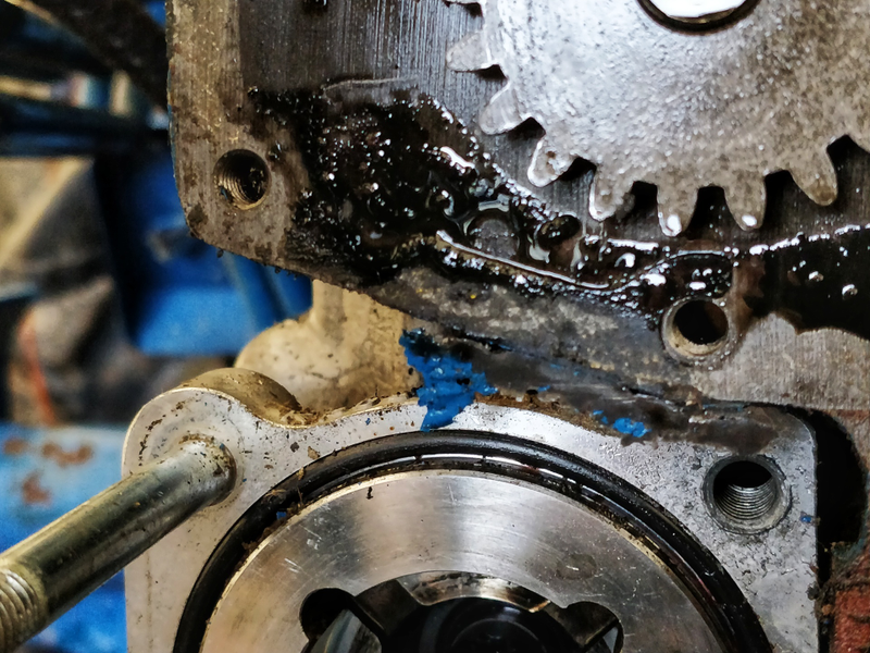 Theres the source of my leak. That old gasket is toast.